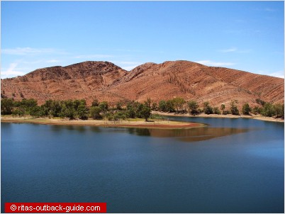 A dam surrounded by steep mountains