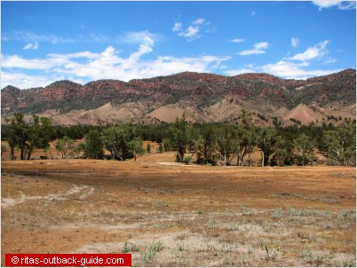 A valley with colourful mountains as backdrop