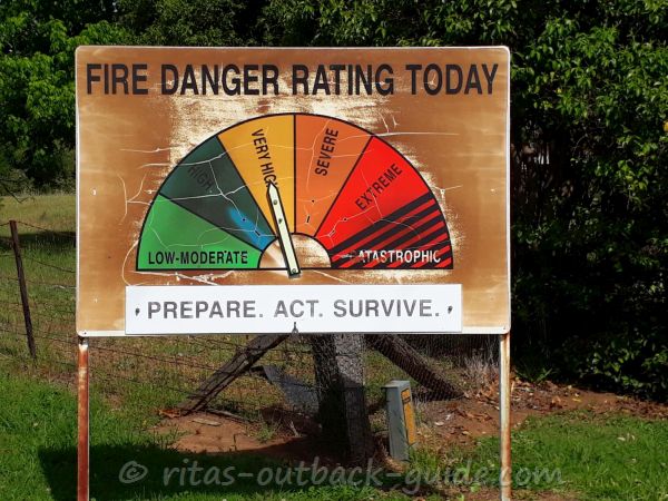 A sign that announces the danger of bushfires A sign that announces the danger of bushfires