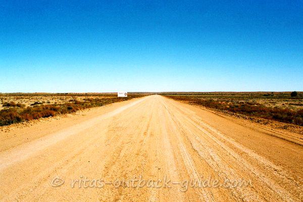 An advertising sign in the desert