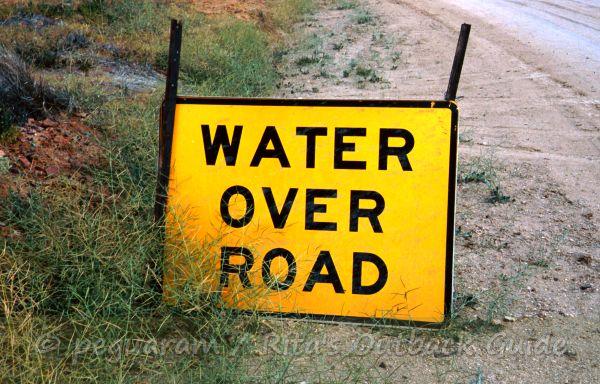 A sign warns about a hazard on the road