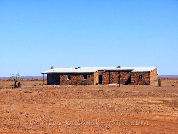 A ruin of a railway cottage along the OT