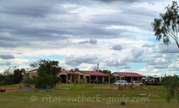 Cabins in the caravan park on a cloudy day in Thargomindah.