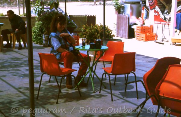 Enjoying a drink at the veranda of the hotel